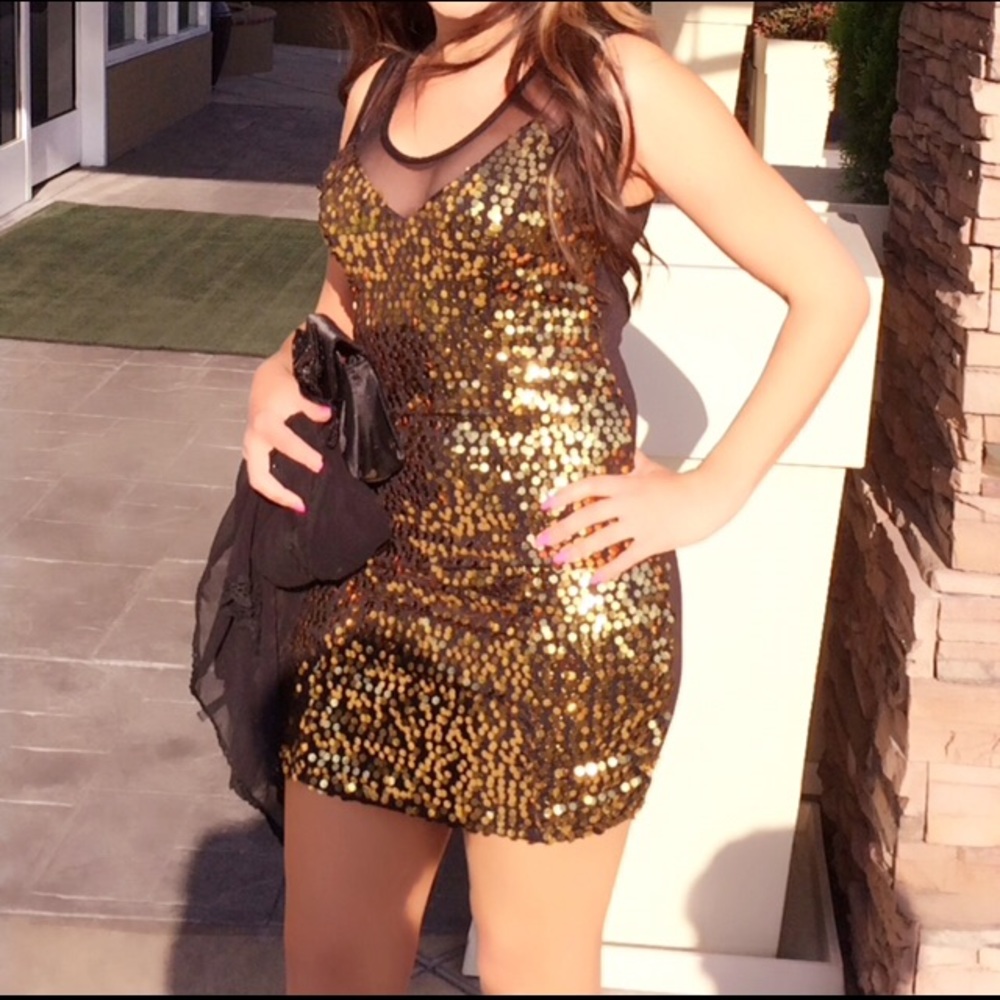 Black dress with gold sequins